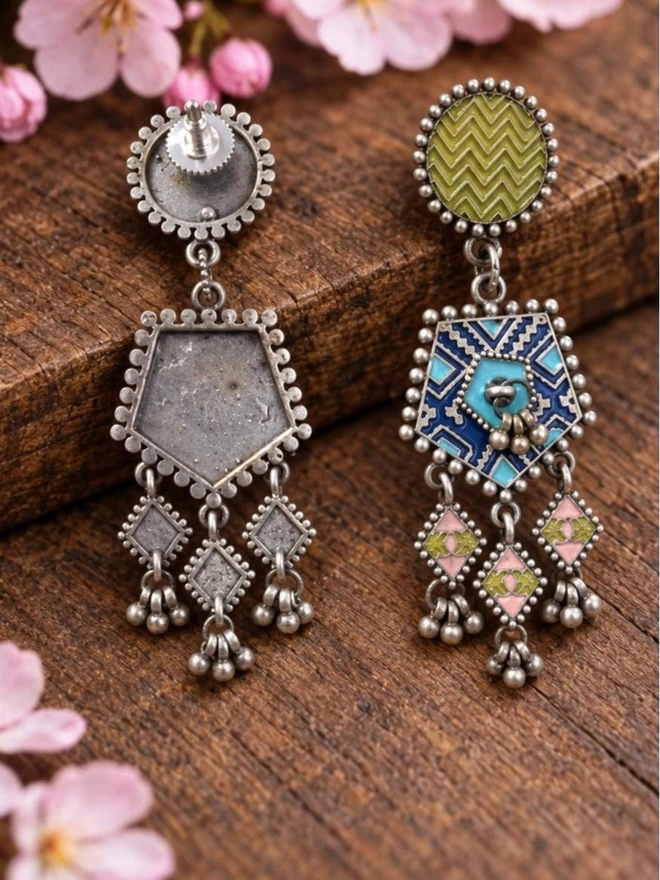 Front and back view of geometric drop earrings showing screw-back stud fitting and plain oxidised silver reverse
