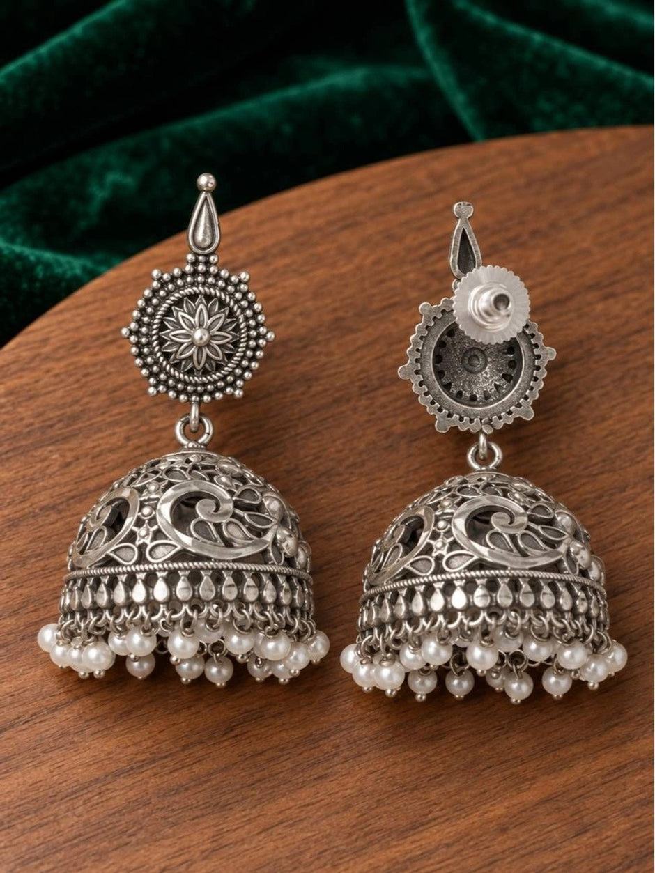 Front and back view of oxidised silver jhumka earrings showing push-back stud fitting