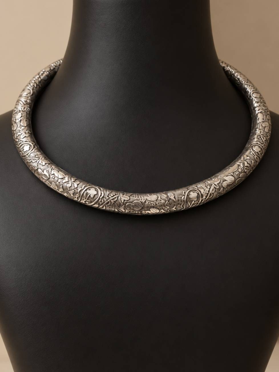 Oxidised silver brass choker necklace displayed on a black jewellery mannequin bust