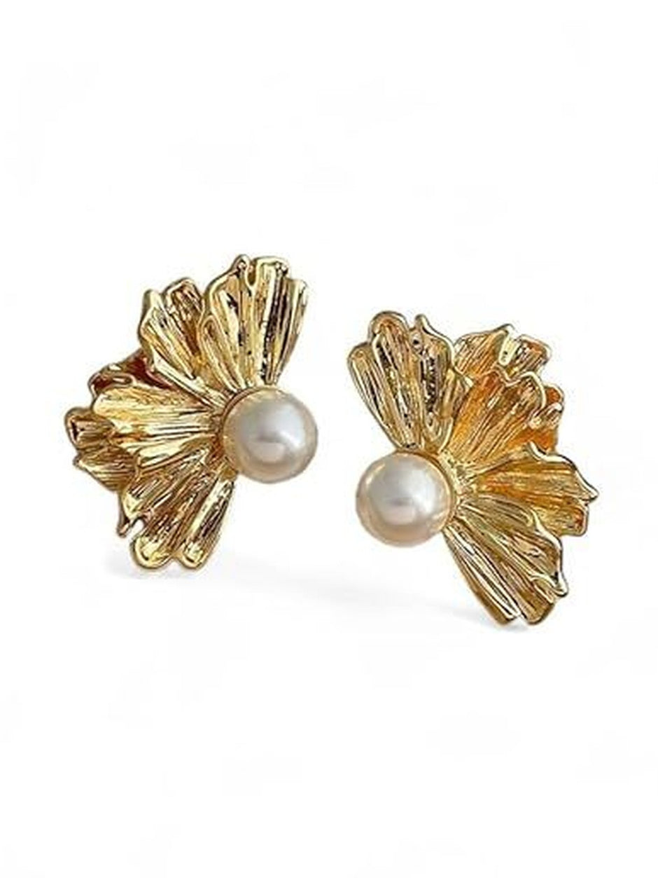 Pair of gold-plated textured floral stud earrings with faux pearl centre on white background