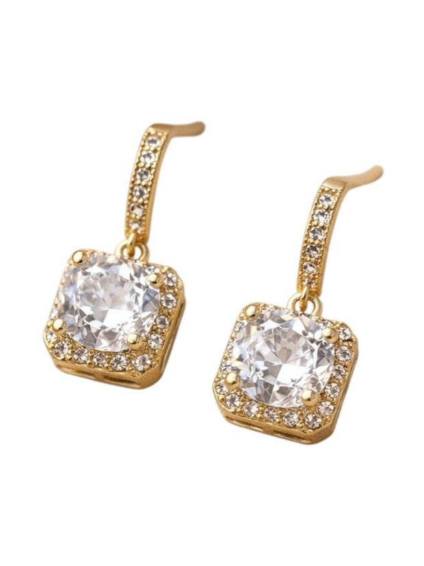 Gold-plated CZ square halo drop earrings displayed against a clean white background