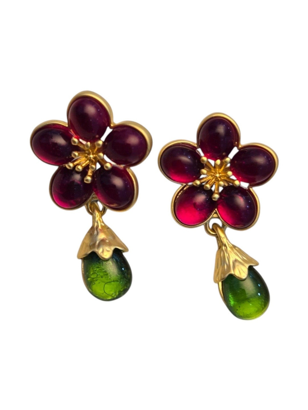 Full view of both gold floral drop earrings showing magenta cabochon petals and vivid green teardrop on a clean white background