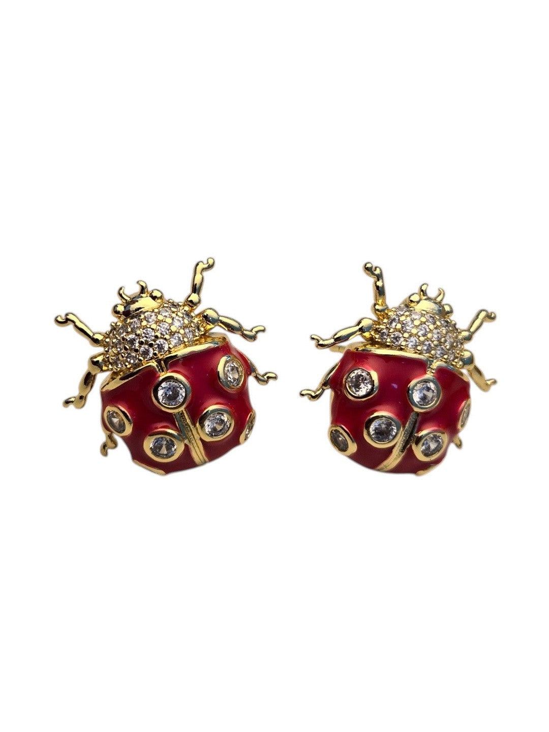Front-facing product shot of red enamel ladybug studs with pavé thorax and bezel-set CZ stones on white background