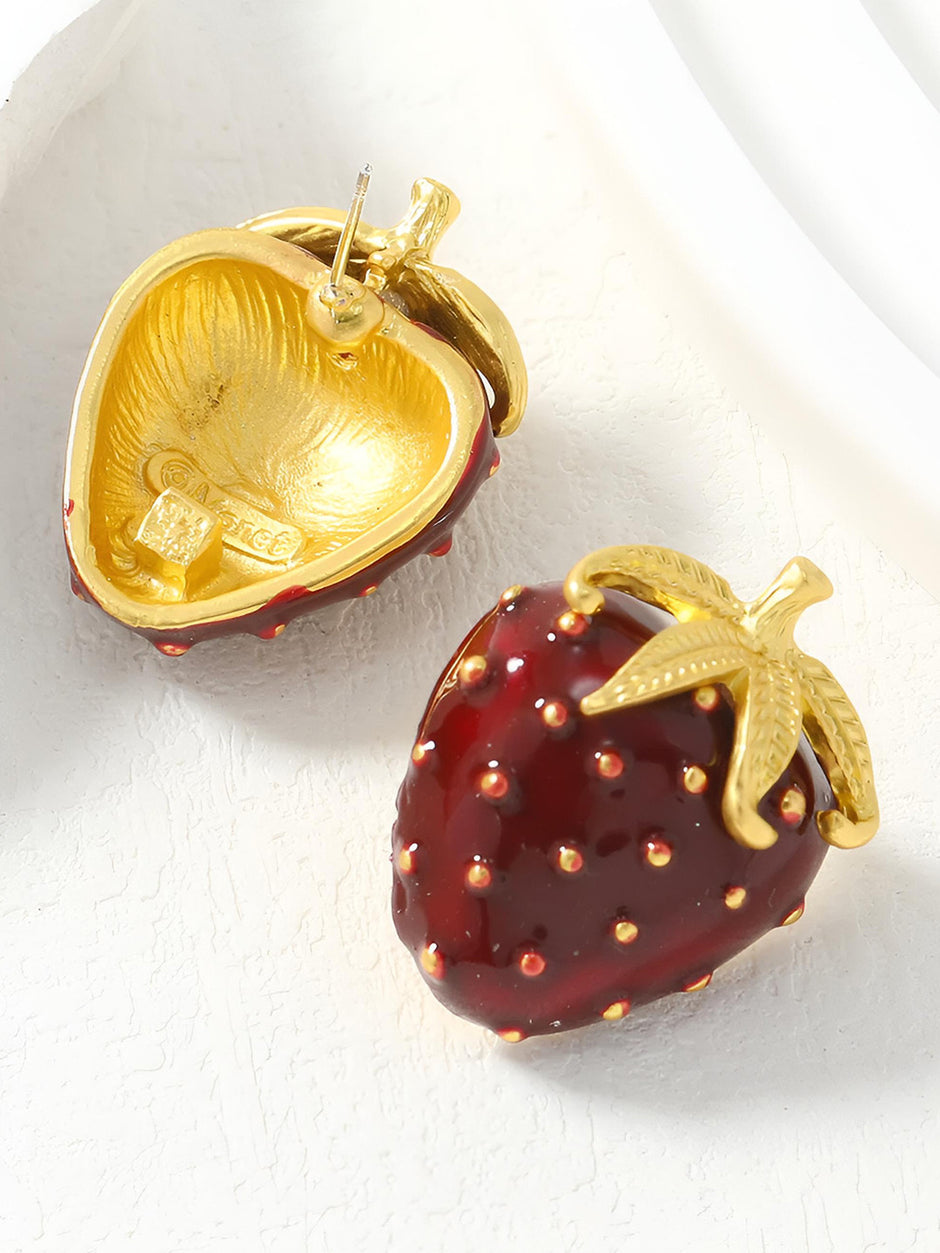 Back view of red enamel strawberry earring showing gold hollow interior and post closure with brand stamp