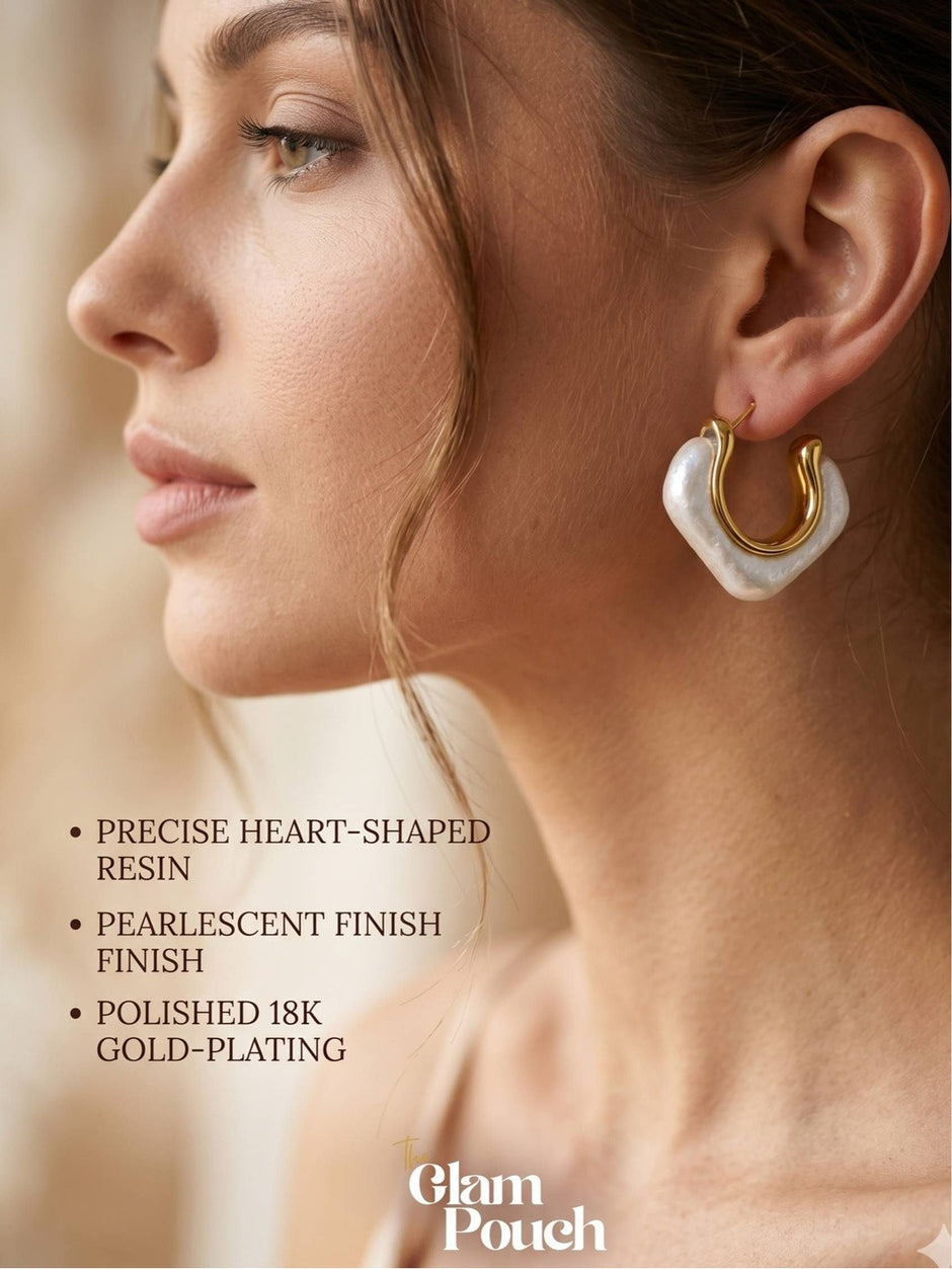Side profile of woman wearing pearlescent gold-plated resin hoop earring on right ear