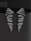Both silver pave cubic zirconia spiral bar earrings displayed upright against a dark grey background