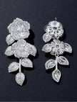 Front and back view of one silver CZ floral drop earring showing filigree reverse and stud post