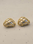 Two gold twisted rope heart stud earrings with lustrous pearl inlay panels on a light speckled background