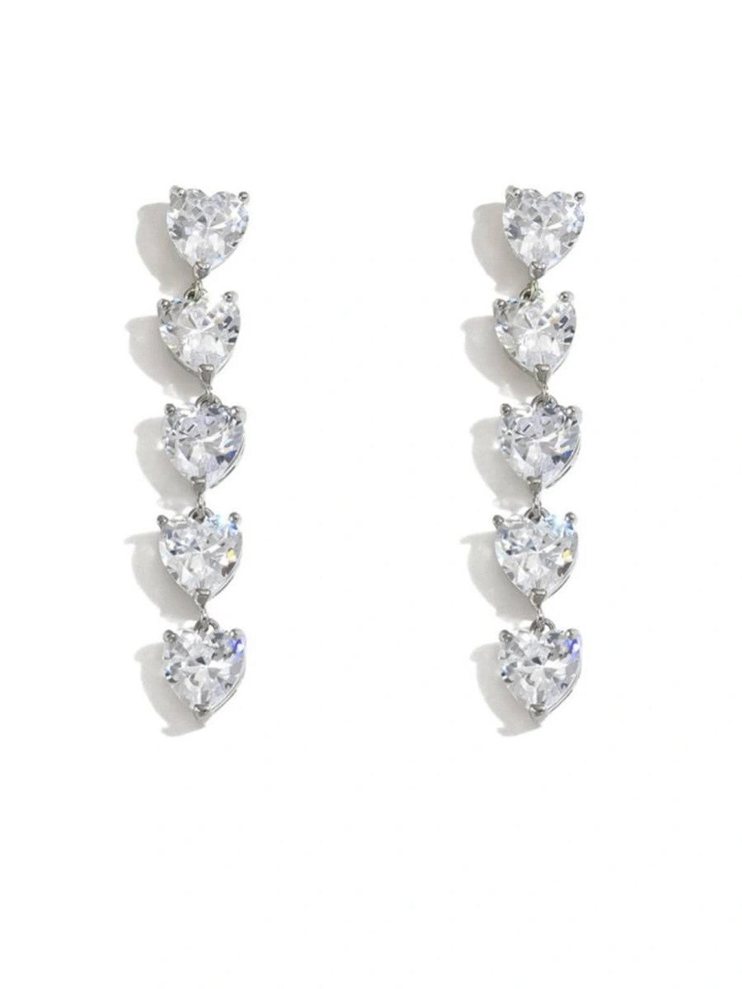 Both heart drop earrings photographed flat on a white background showing full length and symmetry