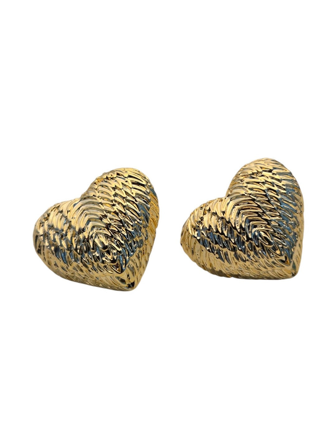 Two chunky gold-tone textured heart stud earrings displayed on a clean white background