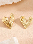 Front and back view of gold heart stud earrings showing push-back post fastening