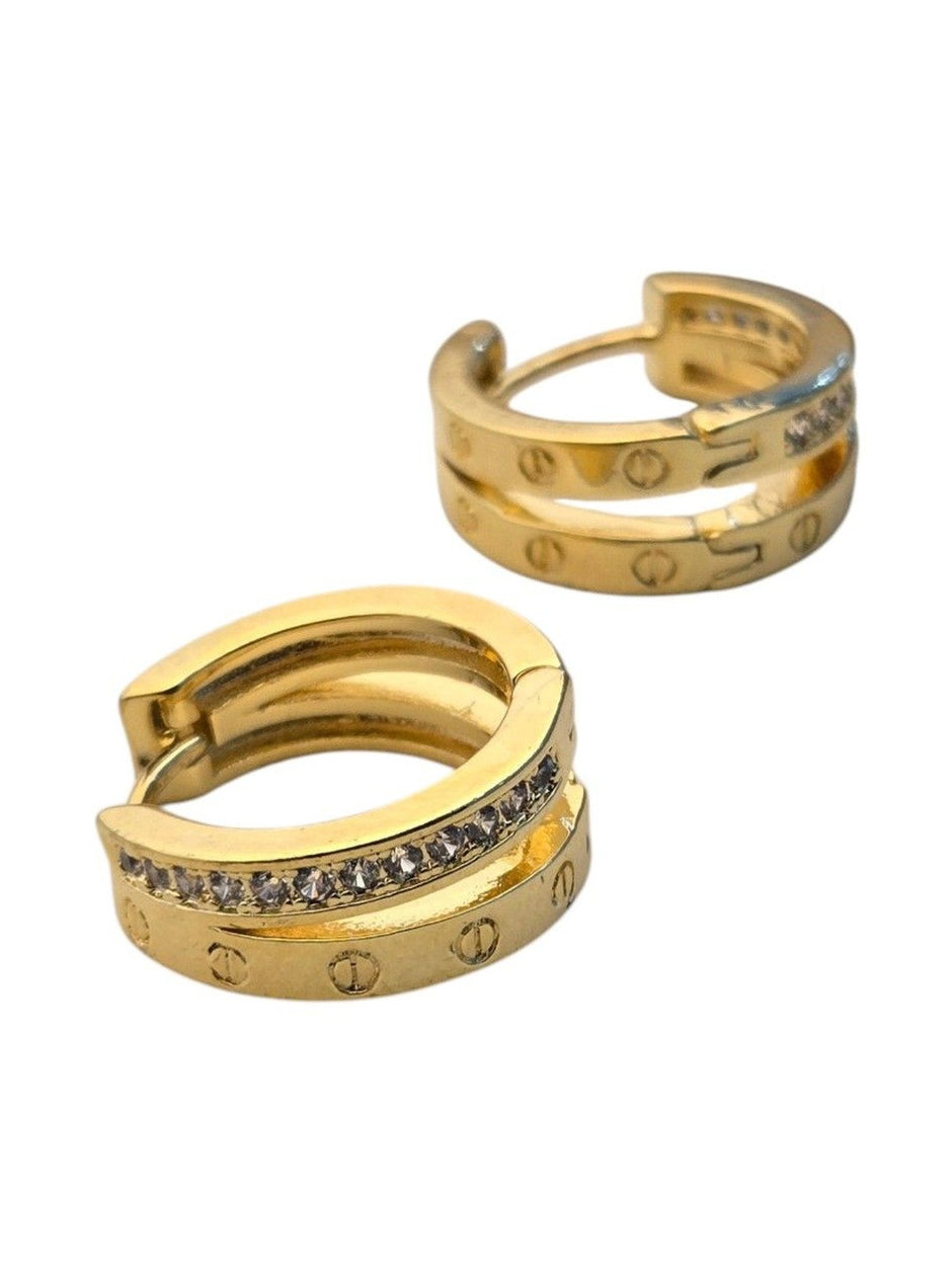 Both gold-plated crystal huggie hoops side by side on white background showing snap closure