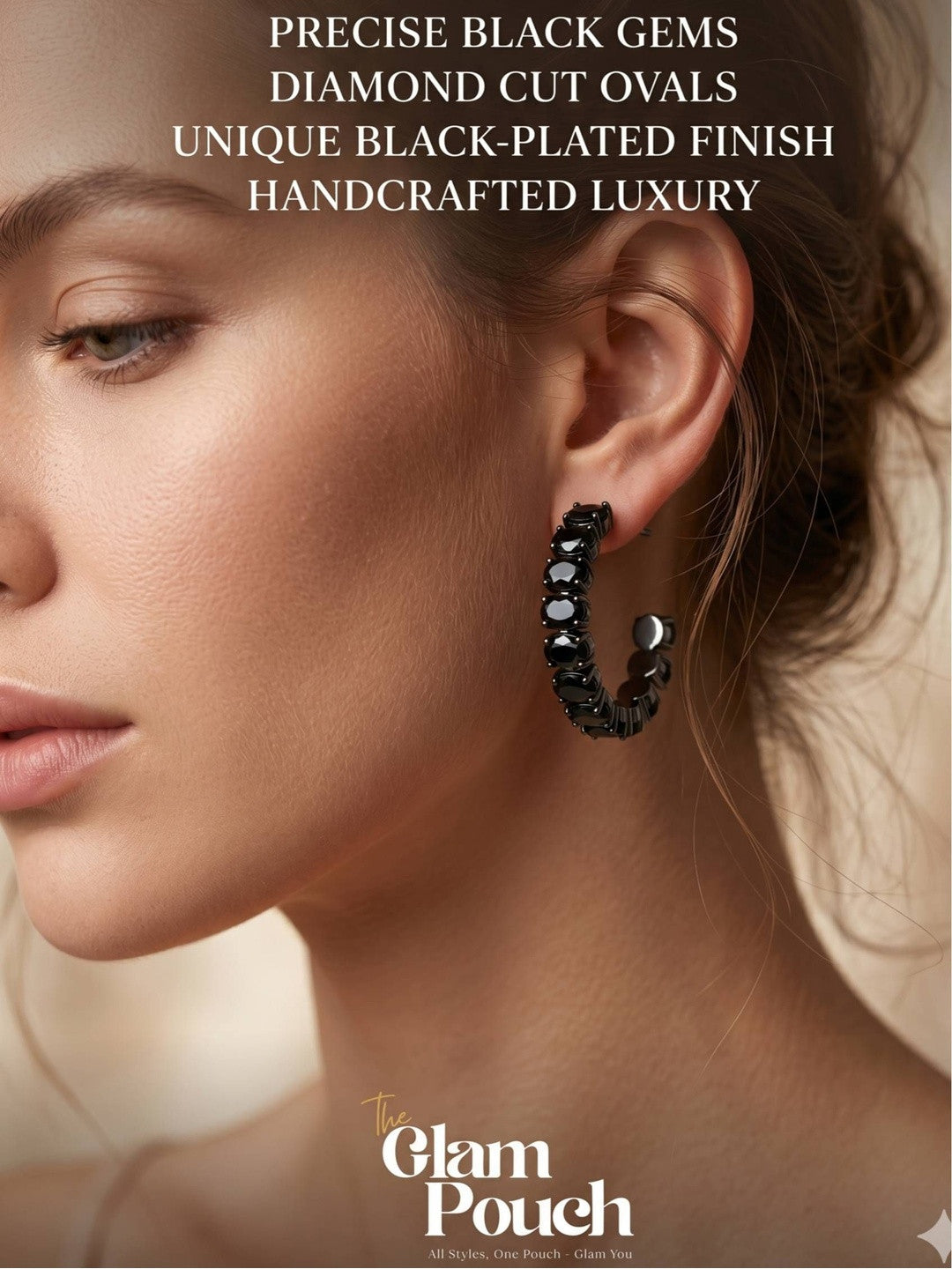 Woman wearing a single black oval crystal hoop earring shown in close side profile