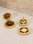 Back view of gold-plated oval drop earrings showing post fitting and circular open-frame reverse