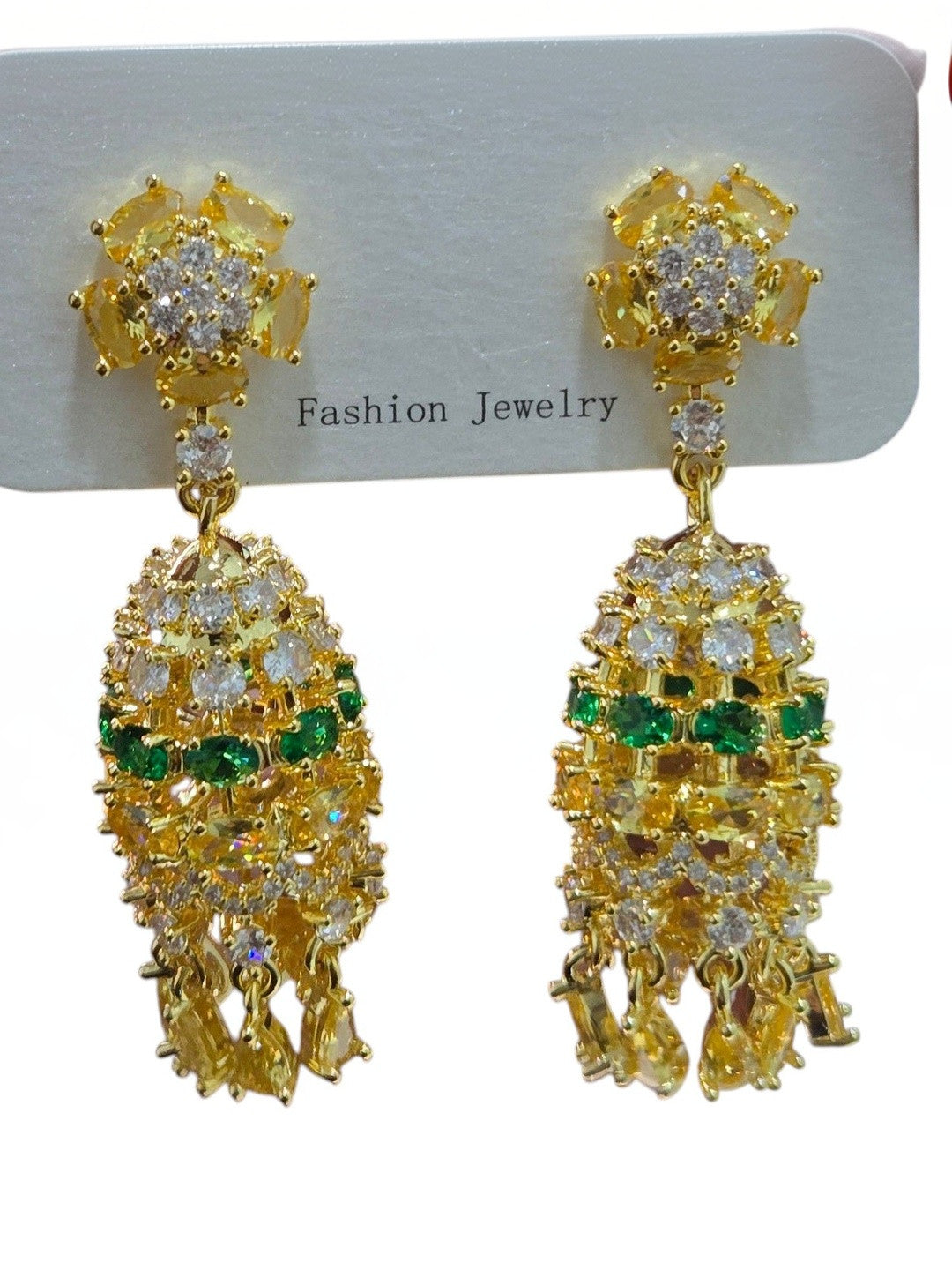Gold-plated CZ chandelier earring pair mounted on a white fashion jewellery card showing front and back detail