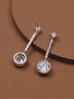 Silver-tone CZ halo drop earrings displayed side by side on a brown surface, showing front and back angles