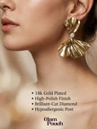 Model wearing oversized gold bow earring on ear showing scale and drape