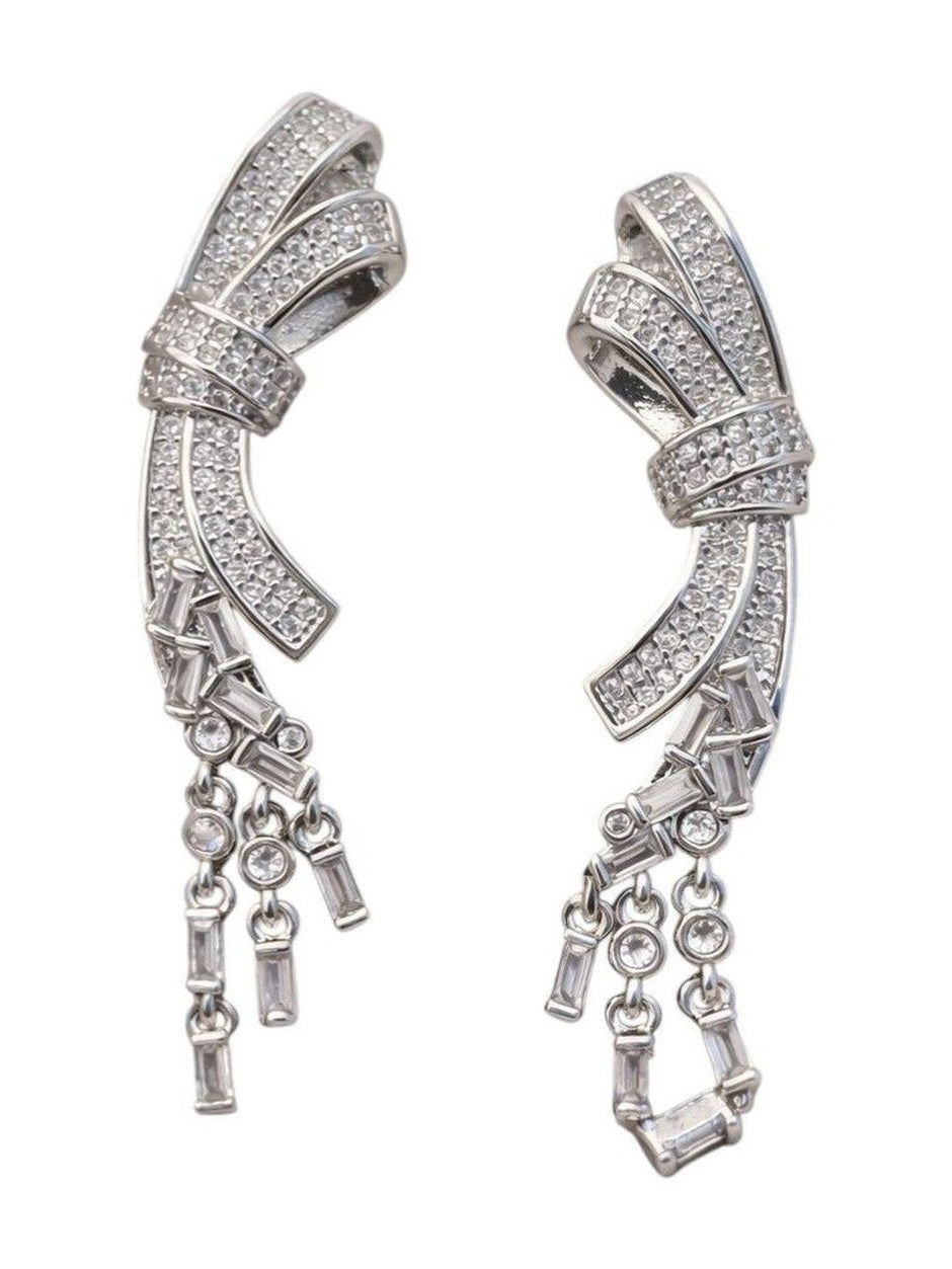Duplicate of image five — same on-ear shot of the silver CZ bow drop earring