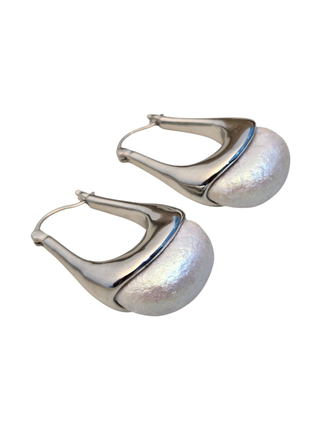 Silver pearl dome hoop earrings photographed against a clean white background showing full silhouette and finish