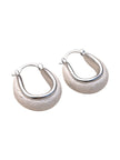 Front-facing pair of silver oval hoop earrings with polished frame and matte composite base on white background