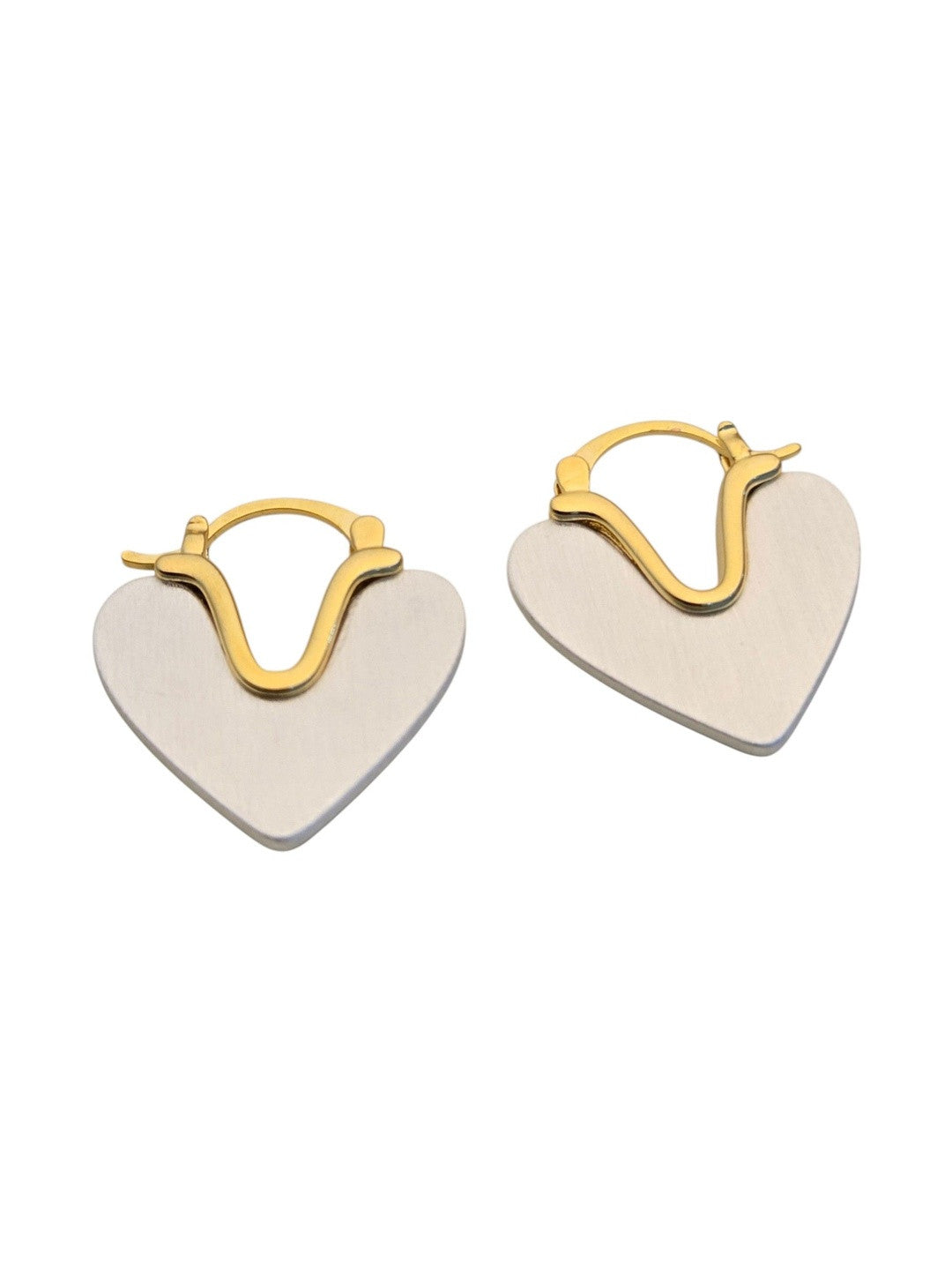 Two-tone heart hoop earrings on white background showing lever-back clasp and brushed silver heart charm clearly