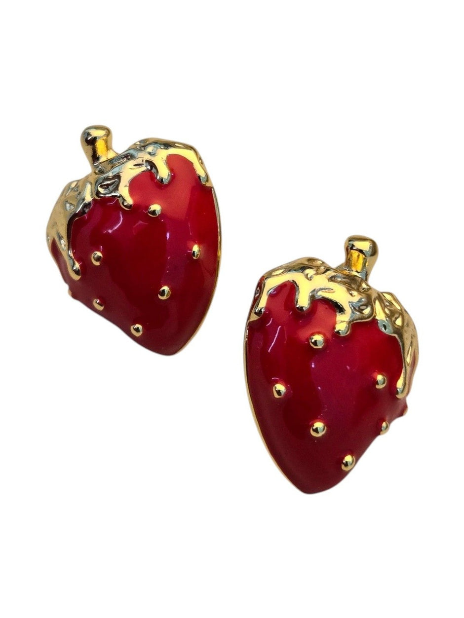 Close-up of red enamel strawberry stud earrings showing raised gold seed dots on a white background
