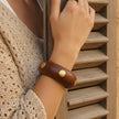 Chunky Polished Wooden Bangle with Gold Disc Inlays