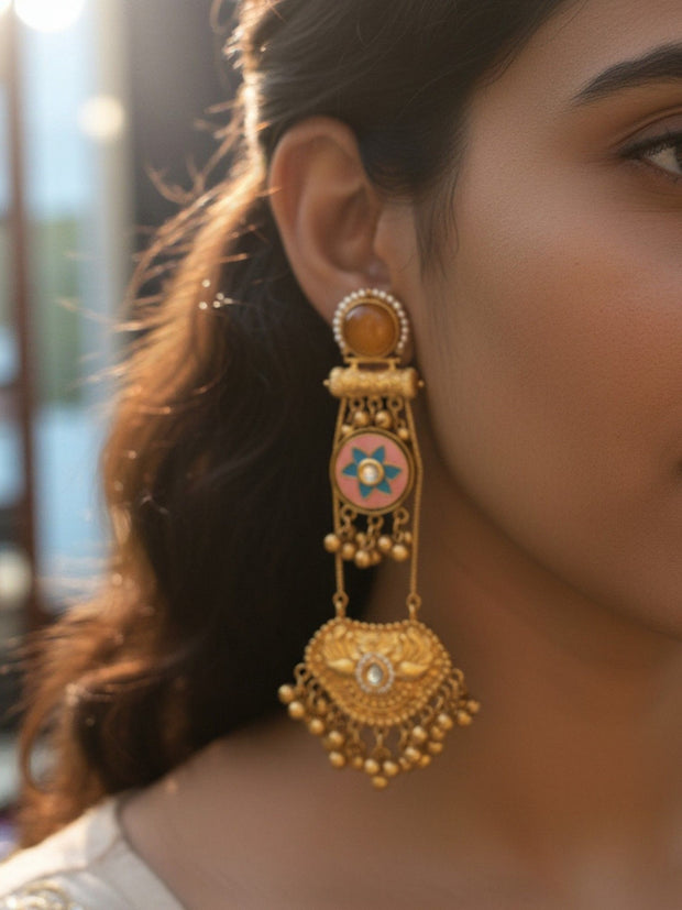 Gold-plated meenakari chandbali earring worn on a woman's ear showing full length and scale