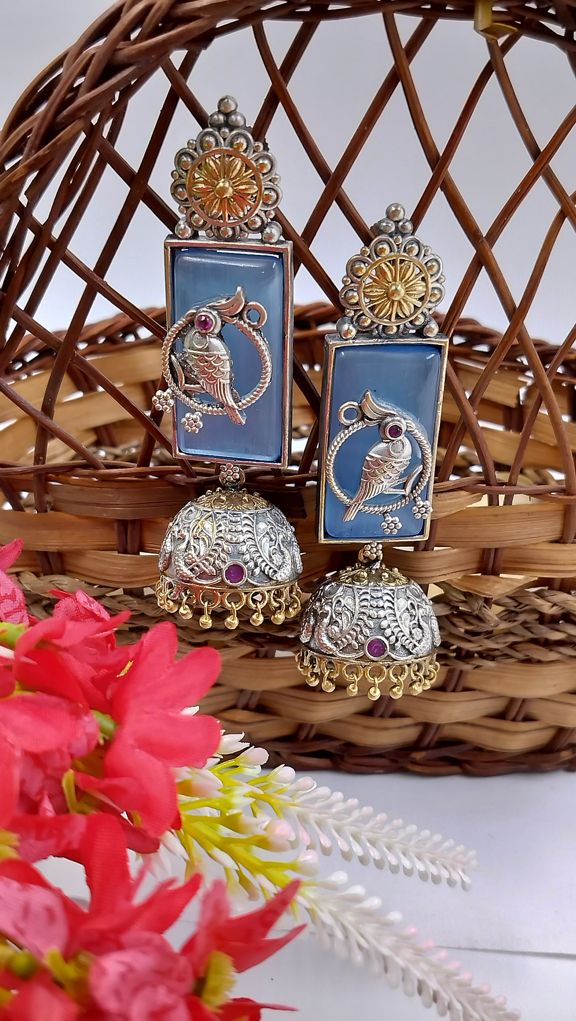 Serene blue with intricate parrot motifs – elegance that speaks of tradition & charm.