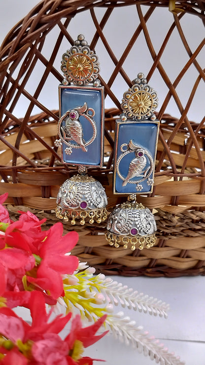 Serene blue with intricate parrot motifs – elegance that speaks of tradition & charm.