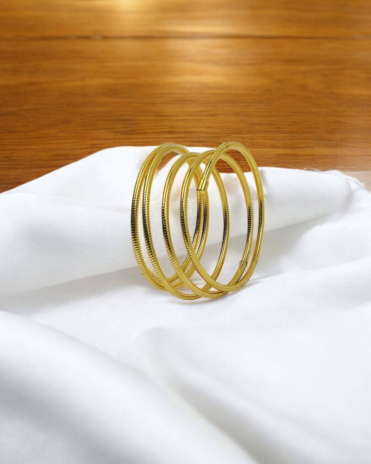 Elegant gold plated textured bangles set – lightweight, versatile, and perfect for daily wear as well as festive occasions, adding a graceful charm to your style.