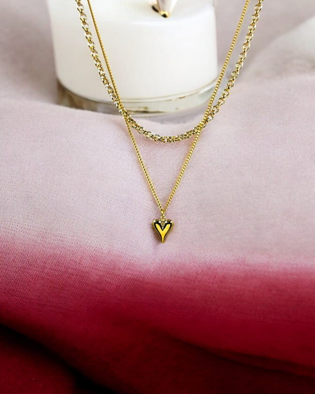 Gold plated layered chain necklace with tiny heart pendant, elegant minimalist jewelry perfect for daily wear and gifting.