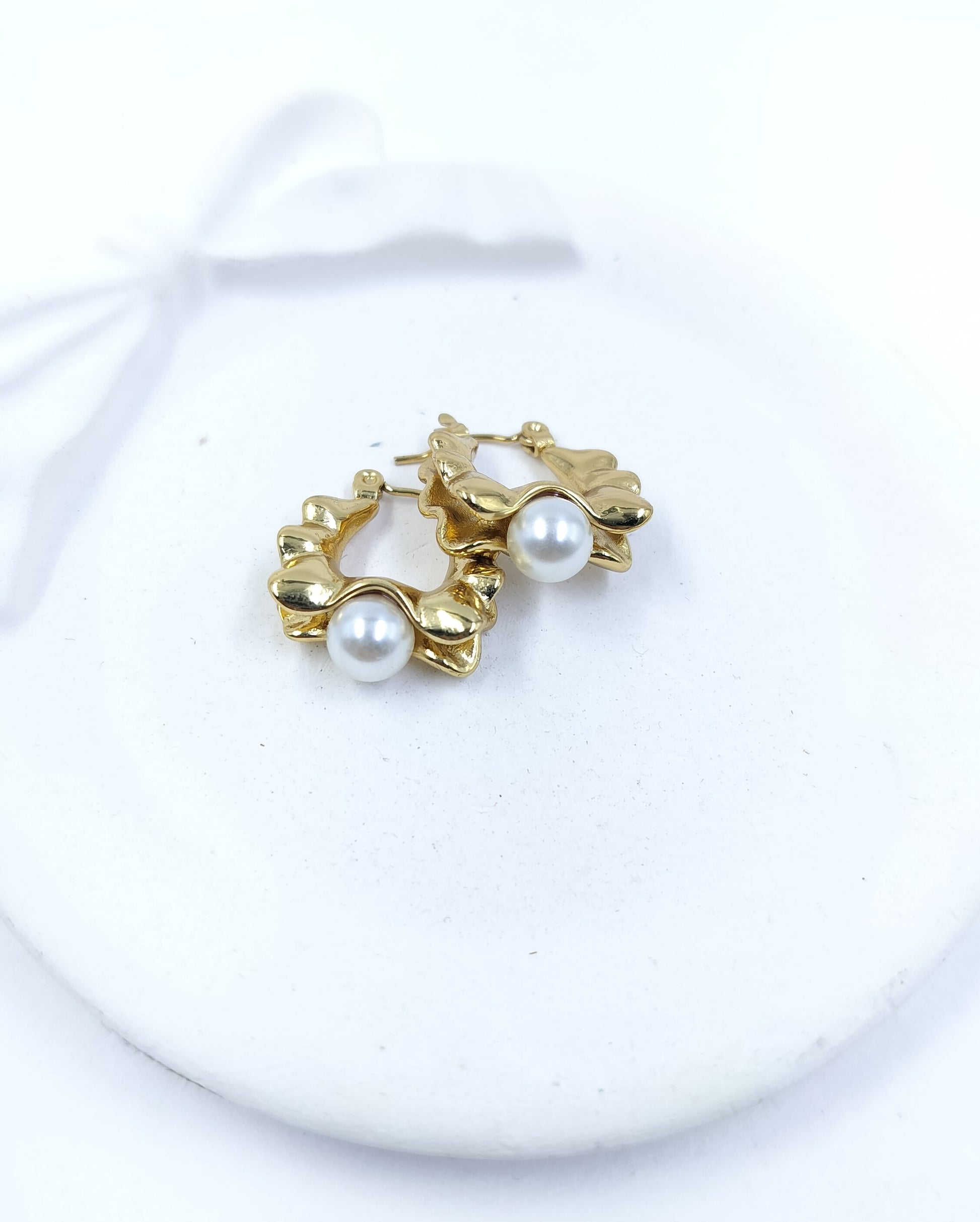 Stylish gold hoop earrings with pearl drop design, lightweight anti-tarnish jewelry perfect for women’s festive and party looks.