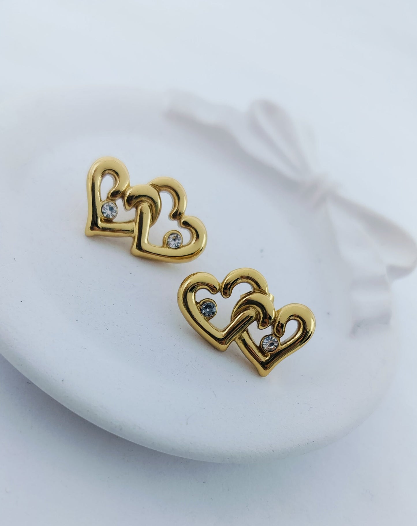 Interlocking Hollow Double Heart Zircon Stud Earrings