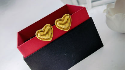 Gold textured heart stud earrings in red and black box, romantic and stylish jewelry gift for women