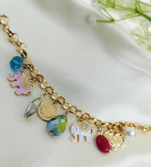 Gold charm bracelet with colorful gemstone beads and enamel elephant, heart, coin, and pearl charms, trendy women's jewelry