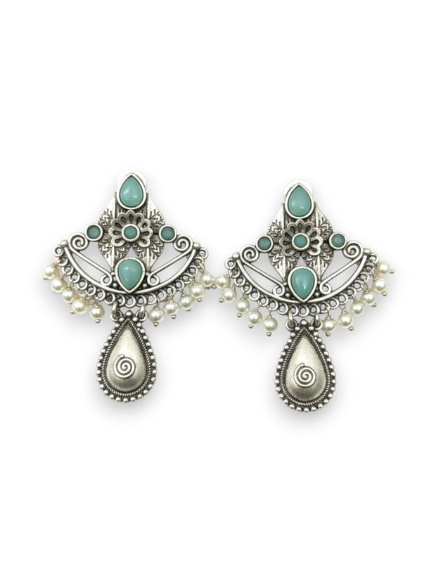 Pair of oxidised silver fan-shaped earrings with turquoise cabochons, pearl drops and teardrop spiral pendant on white background