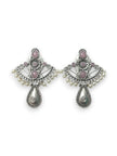 Front view of both oxidised silver chandbali earrings with blush-pink cabochons and teardrop pendant on white background