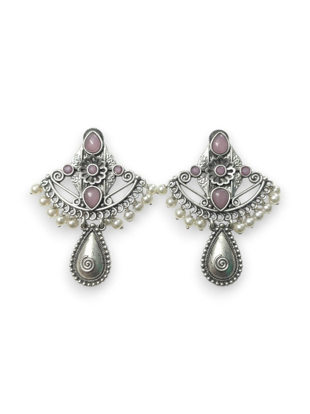 Front view of both oxidised silver chandbali earrings with blush-pink cabochons and teardrop pendant on white background