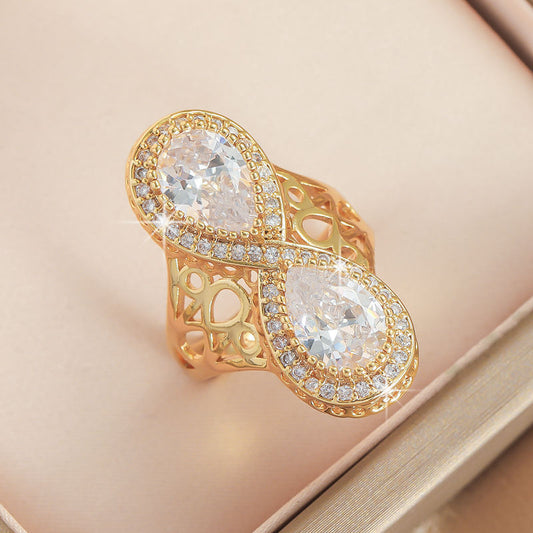 Regal Infinity Filigree Dual Pear-Cut Statement Giold Diamond Ring