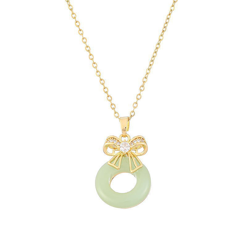 Dainty Gold Bow Pendant