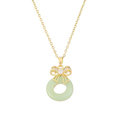 Dainty Gold Bow Pendant