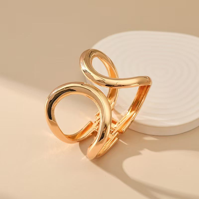 The Infinity Sweep Cuff Bracelet