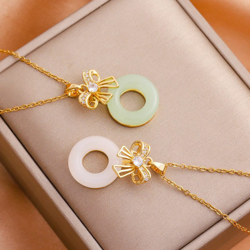 Dainty Gold Bow Pendant