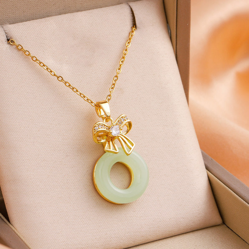 Dainty Gold Bow Pendant