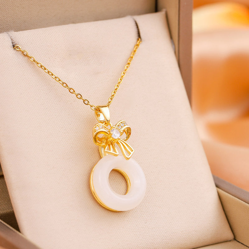 Dainty Gold Bow Pendant
