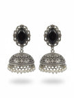 Pair of oxidised silver jhumka earrings with black stone tops and ivory pearl drops on white background