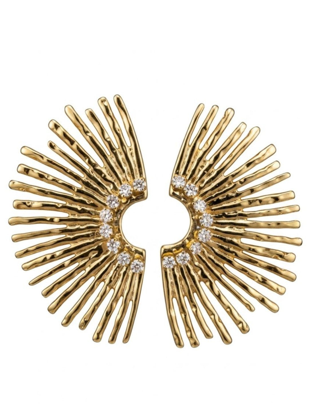 Flat lay of gold-toned sunburst stud earrings together on white background showing symmetrical wing shape