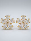 Close-up render of gold-plated CZ flower stud earrings showing pear-cut stone detailing