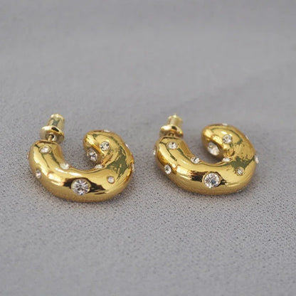 Trendy gold-tone chunky hoop earrings with rhinestone shine, perfect statement jewellery for party and festive wear.